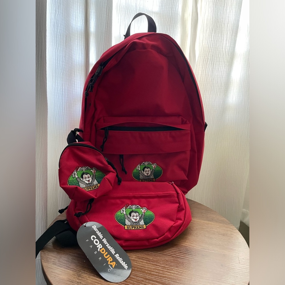 Supreme Vampire Boy Backpack, Mini Backpack, and Fanny Pack “Red”